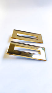 Cutted rectangular shape in gold